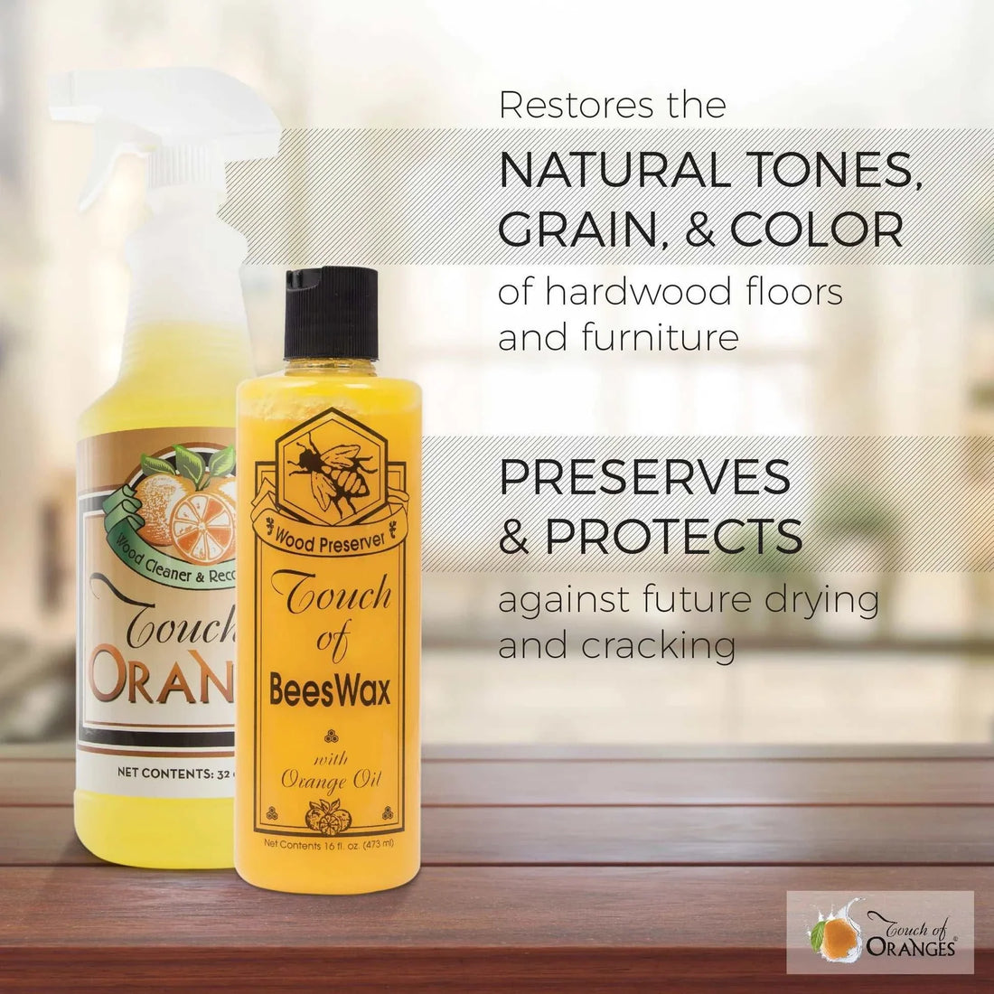 Touch Of Oranges natural wood cleaner spray bottle with orange scent and fresh oranges on white background