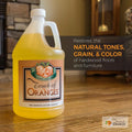 Touch Of Oranges wood cleaner gallon bottle restoring natural tones, grain, and color on hardwood floors and furniture